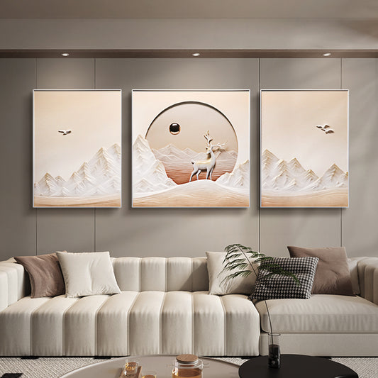 Montrel by La Muse - Three framed wall art depicting a deer in a mountainous landscape above a sofa in a luxury living room interiors - Nature inspired Wall Art