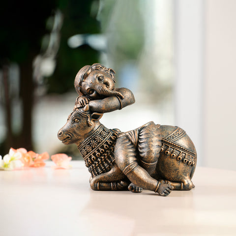 The Harmonic Fusion: Lord Ganesha Sitting on Nandi Sculpture