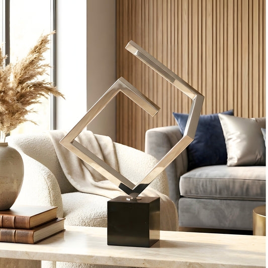 Axiom abstract stainless steel showpiece styled on a luxury coffee table