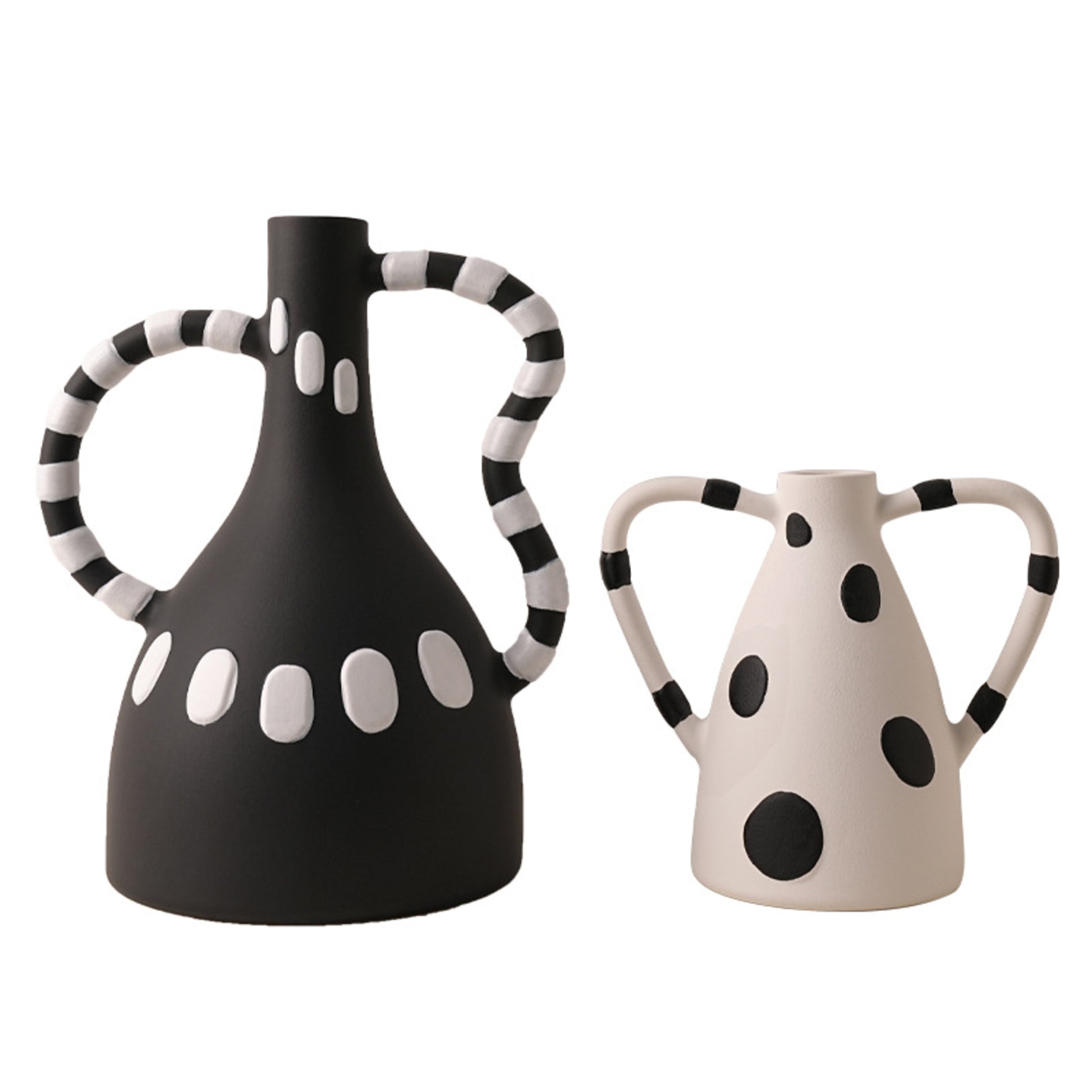 Geometrica black-and-white ceramic table vases styled as a pair