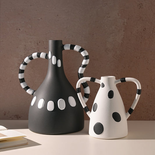 Geometrica polka-dot ceramic vases styled on a console