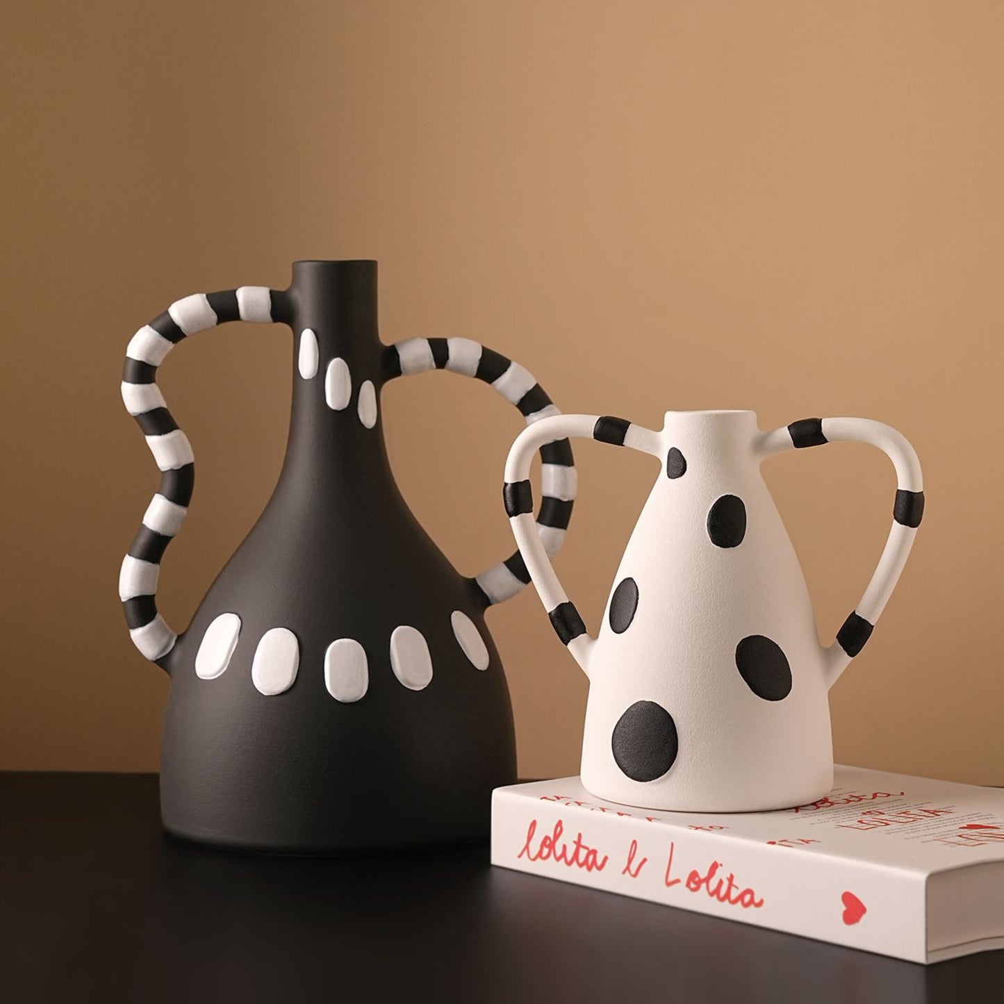 Geometrica polka-dot ceramic vases styled on a sideboard