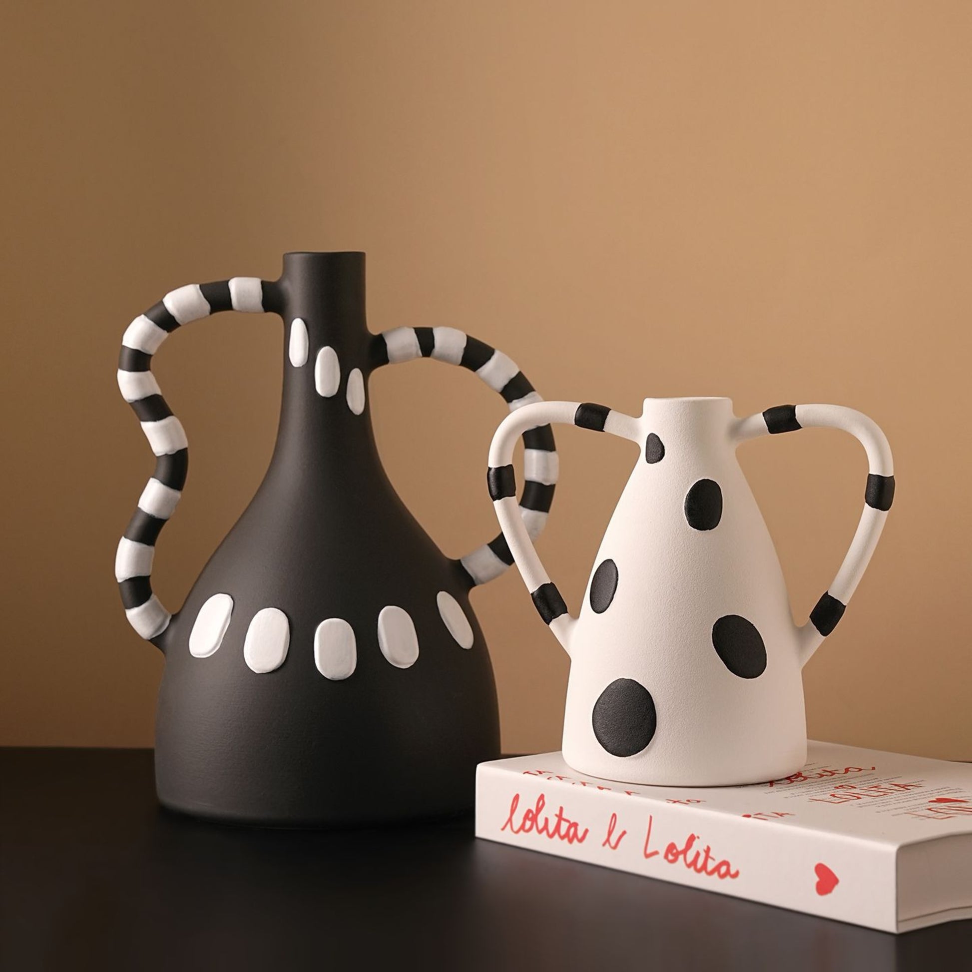 Geometrica polka-dot ceramic vases styled on a sideboard
