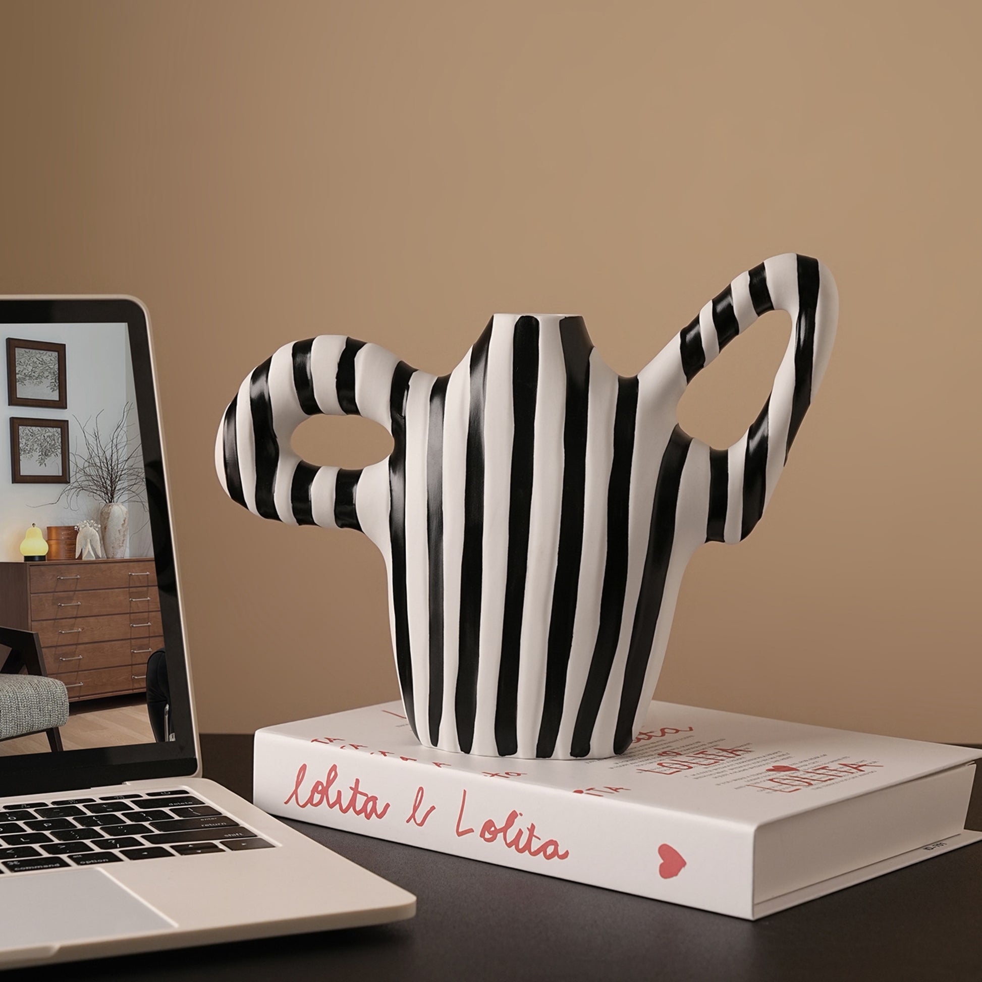 Geometrica striped ceramic table vase styled on an office desk