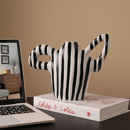 Geometrica striped ceramic table vase styled on an office desk