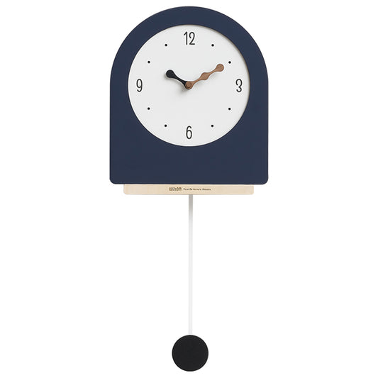 Navy blue wall clock with white face and black pendulum on a white background