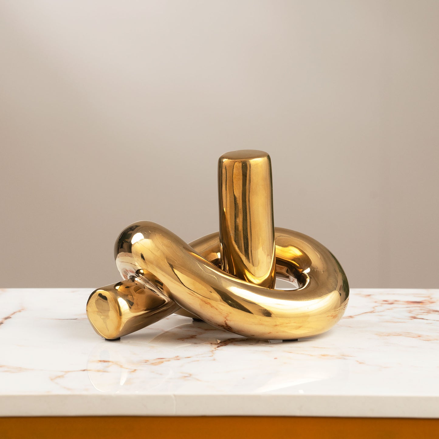 Love’s Eternal Knot - Ceramic Table Showpiece - Gold