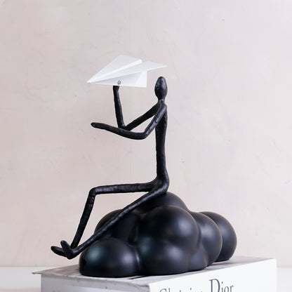Daydreamer - Plane & Sitting Human Figurine