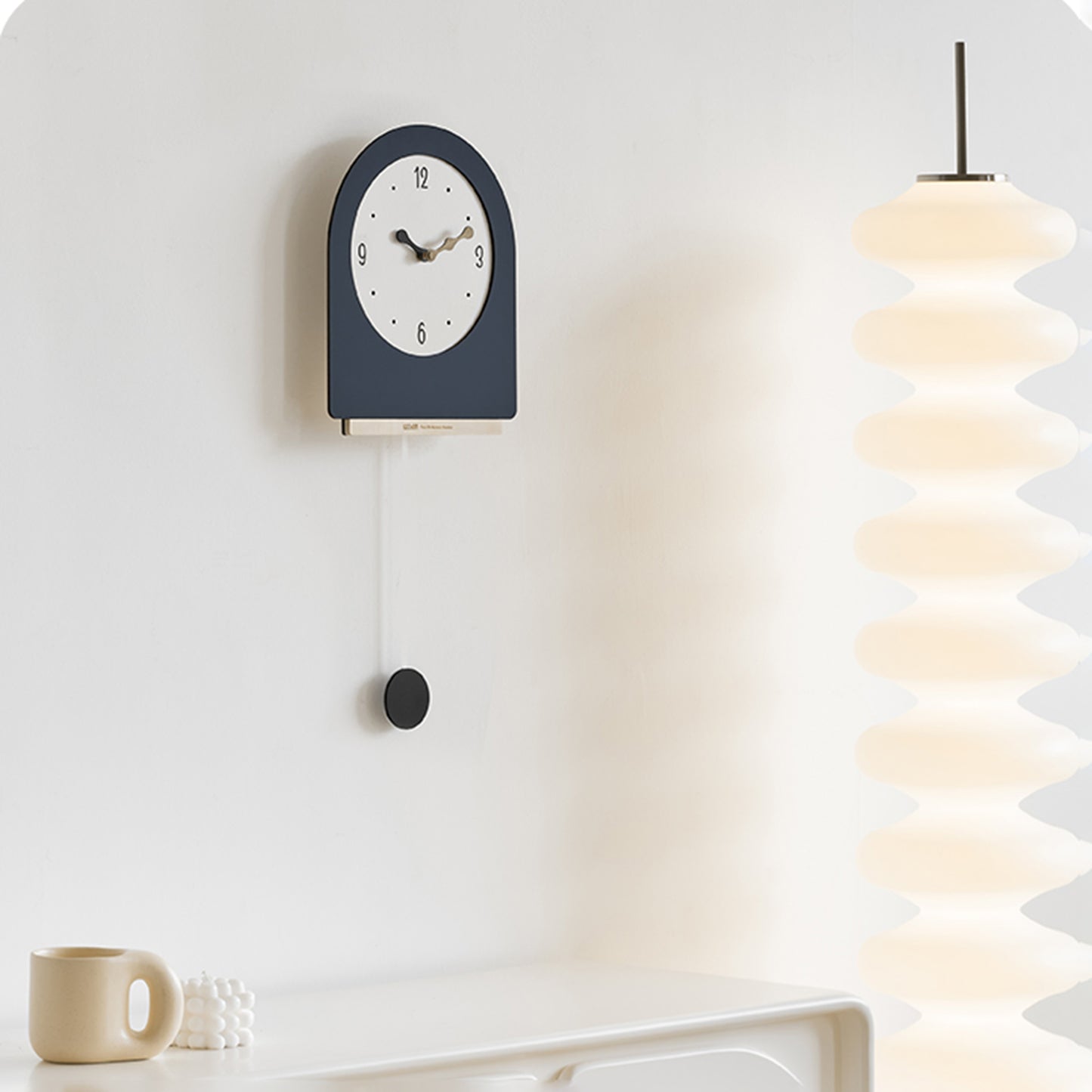 Rivo - Designer Wall Clock with Pendulum
