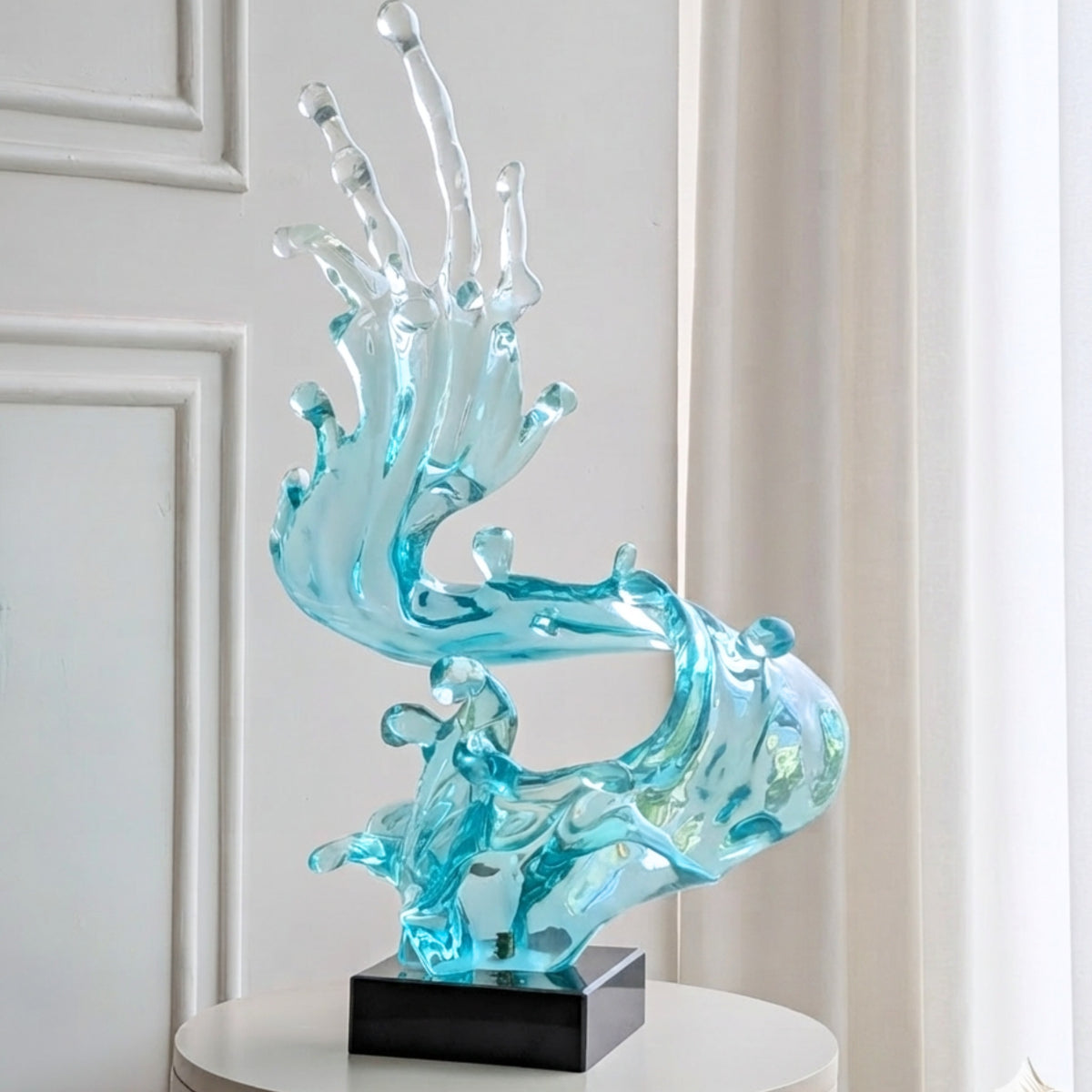 Aqua sculptural resin wave showpiece, angled view