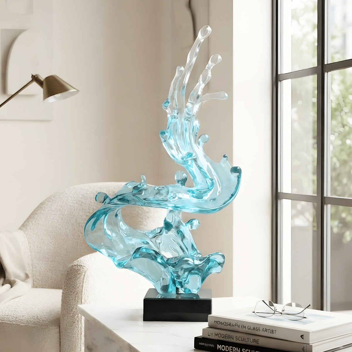 Aqua translucent blue resin and marble showpiece styled in a living room