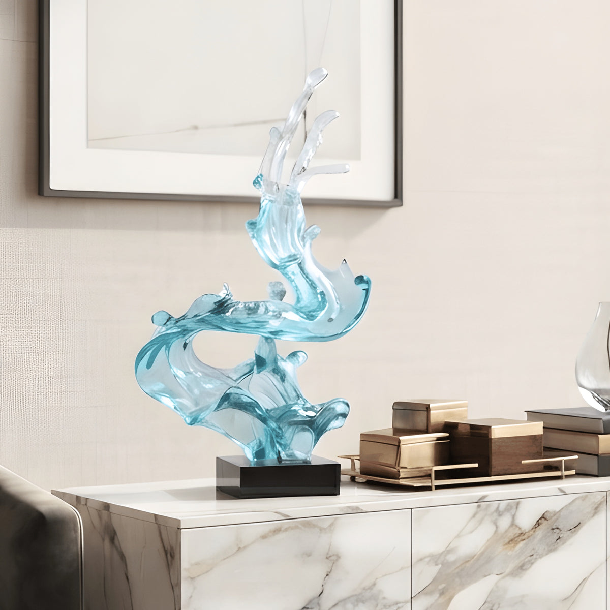 Aqua resin and marble showpiece styled on a console table
