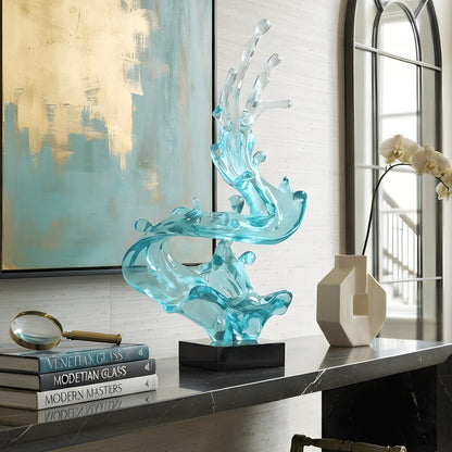 Aqua large resin showpiece styled on a black marble console
