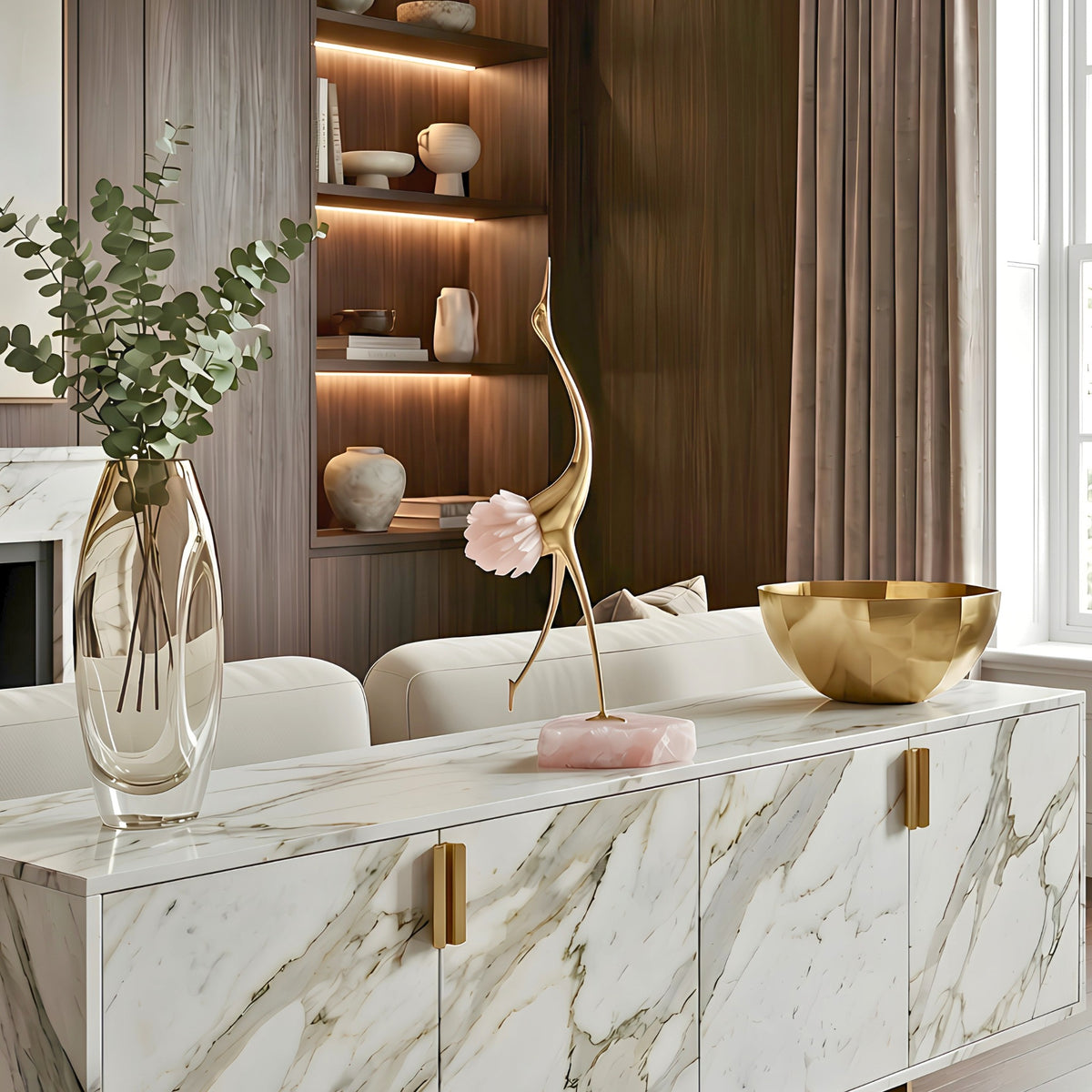 Ardea pink agate and gold-toned metal bird showpiece with upward-reaching neck — styled in a luxury interior
