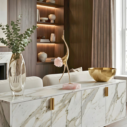 Ardea pink agate and gold-toned metal bird showpiece with upward-reaching neck — styled in a luxury interior