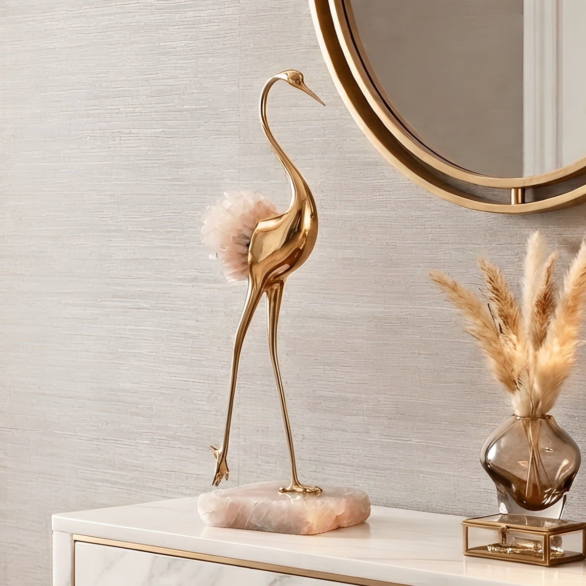 Ardea pink agate and gold-toned metal bird showpiece with curved neck — styled in a luxury interior