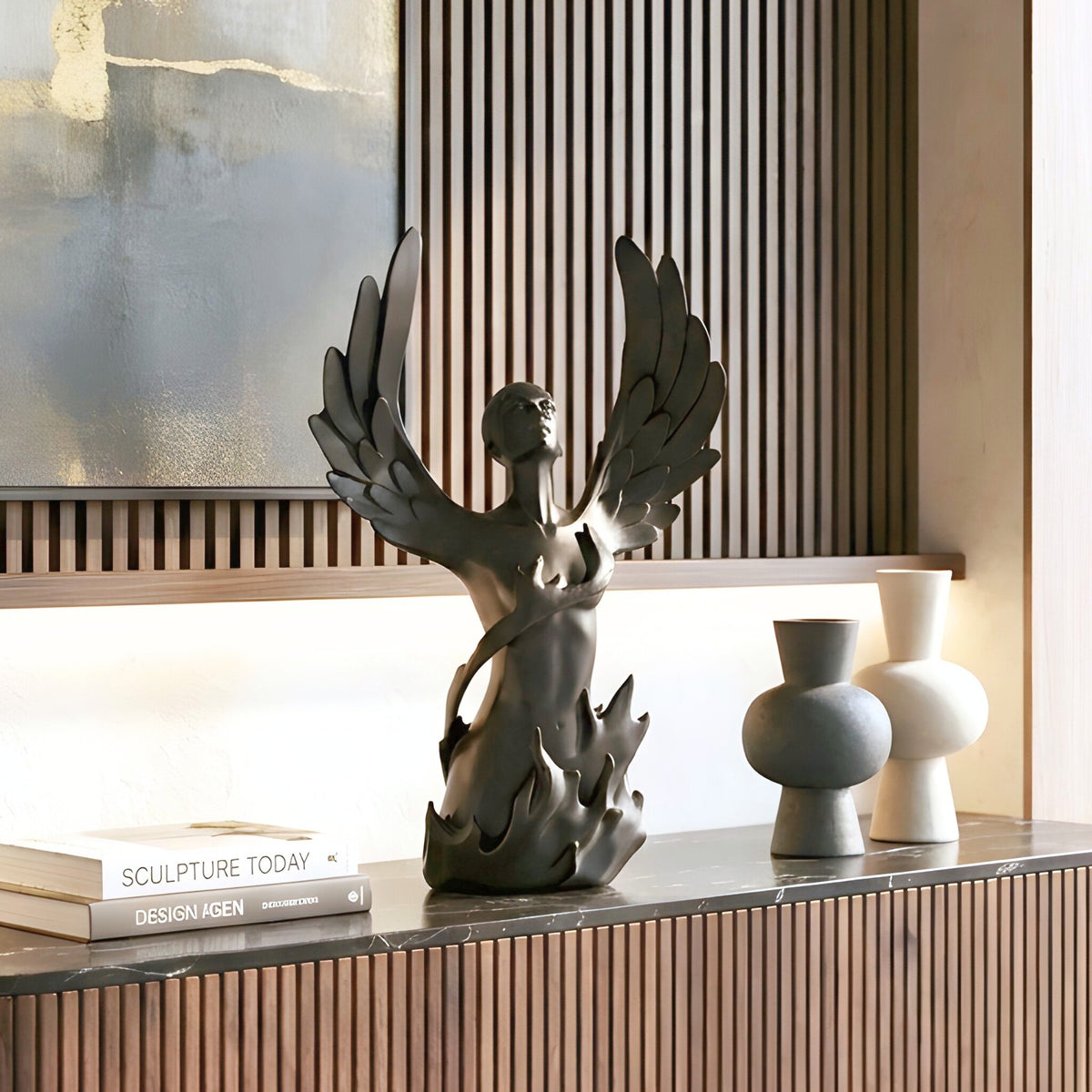 Ascend black resin human figurine styled on a modern sideboard
