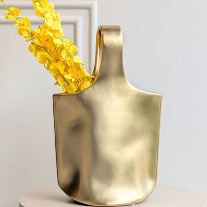 Aurea metallic gold ceramic table vase with yellow flowers front product view