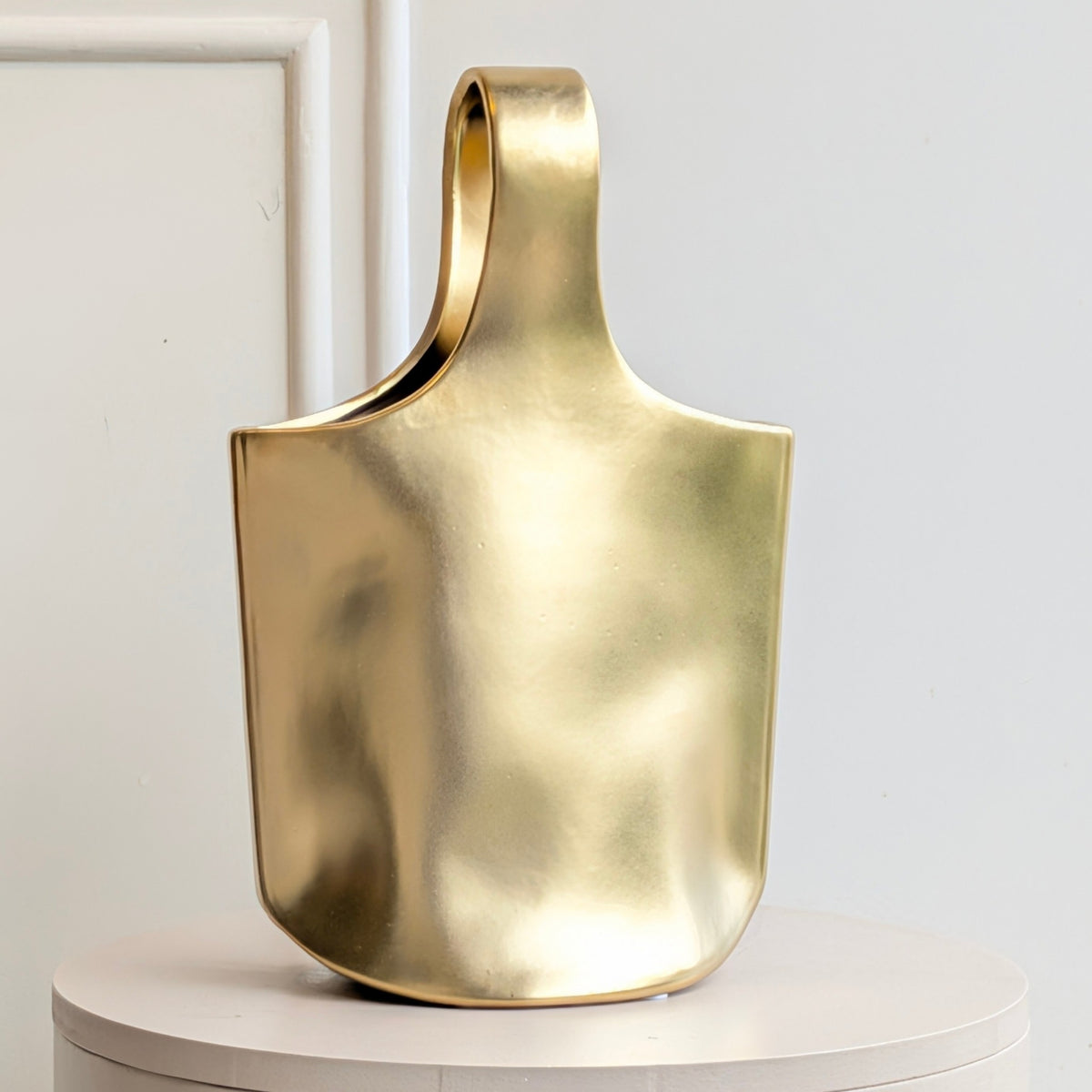 Aurea sculptural gold ceramic vase without flowers front product view