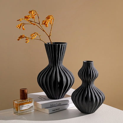 Blackridge fluted ceramic table vases styled on books and a sideboard
