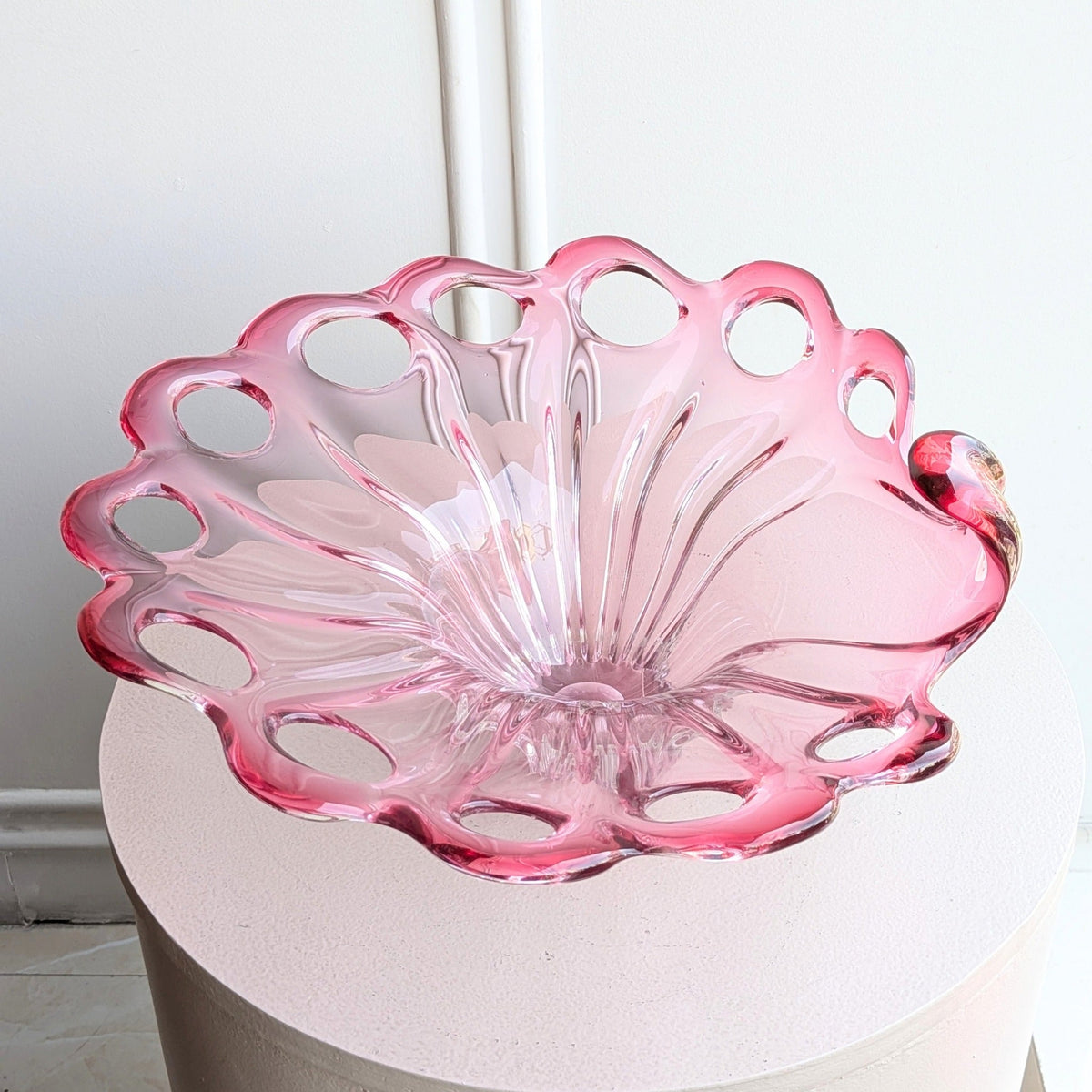 Bloom pink flower-shaped crystal glass decorative bowl angled view
