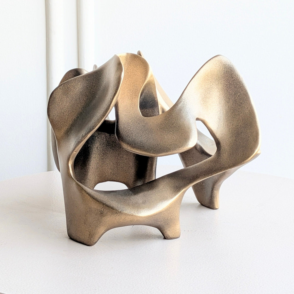 Bronze Modern Abstract Showpiece front product view showing sculptural metal form