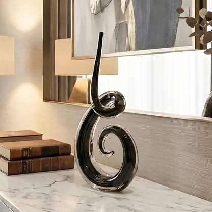 Cadence black crystal showpiece styled beside decorative books