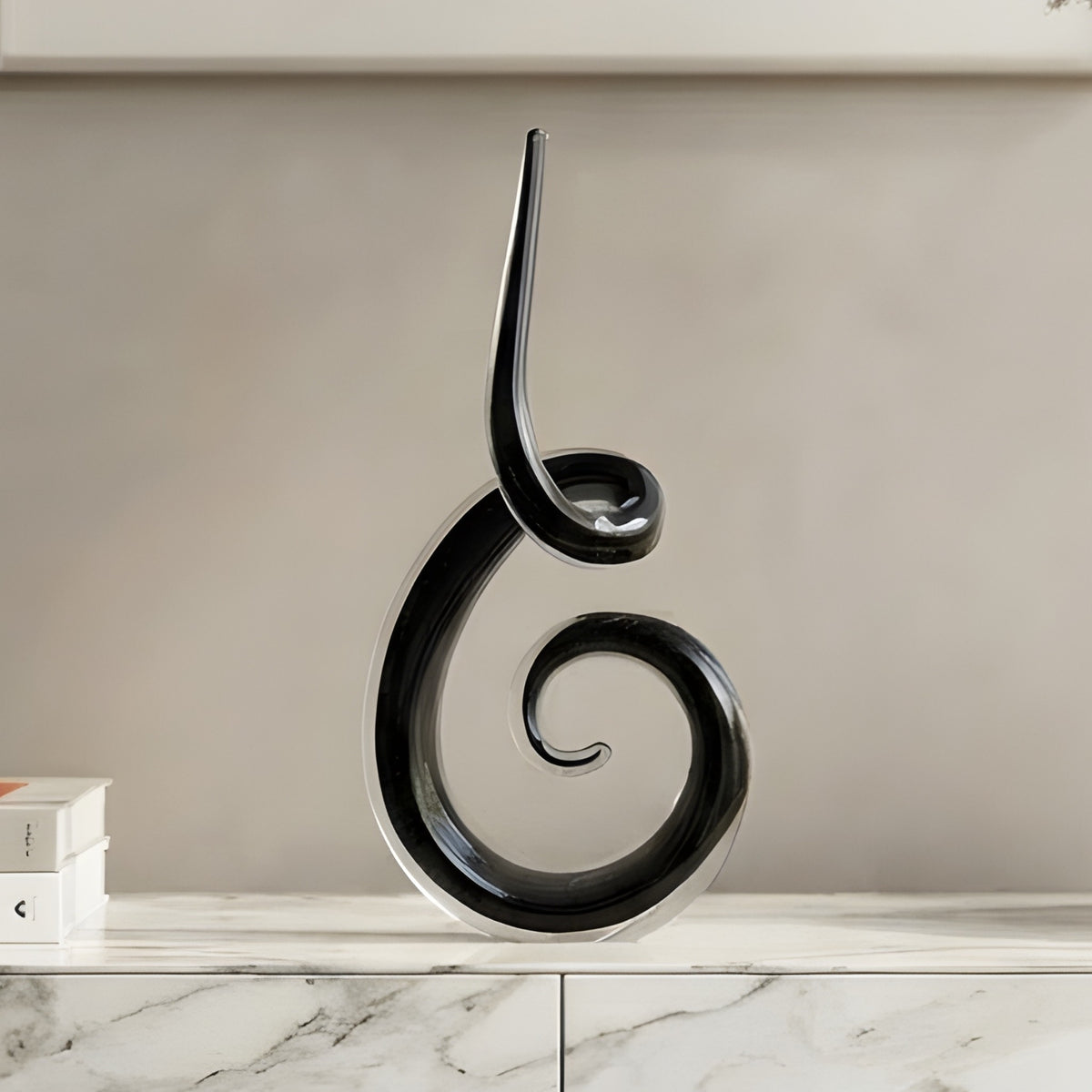Cadence crystal showpiece styled on a marble console