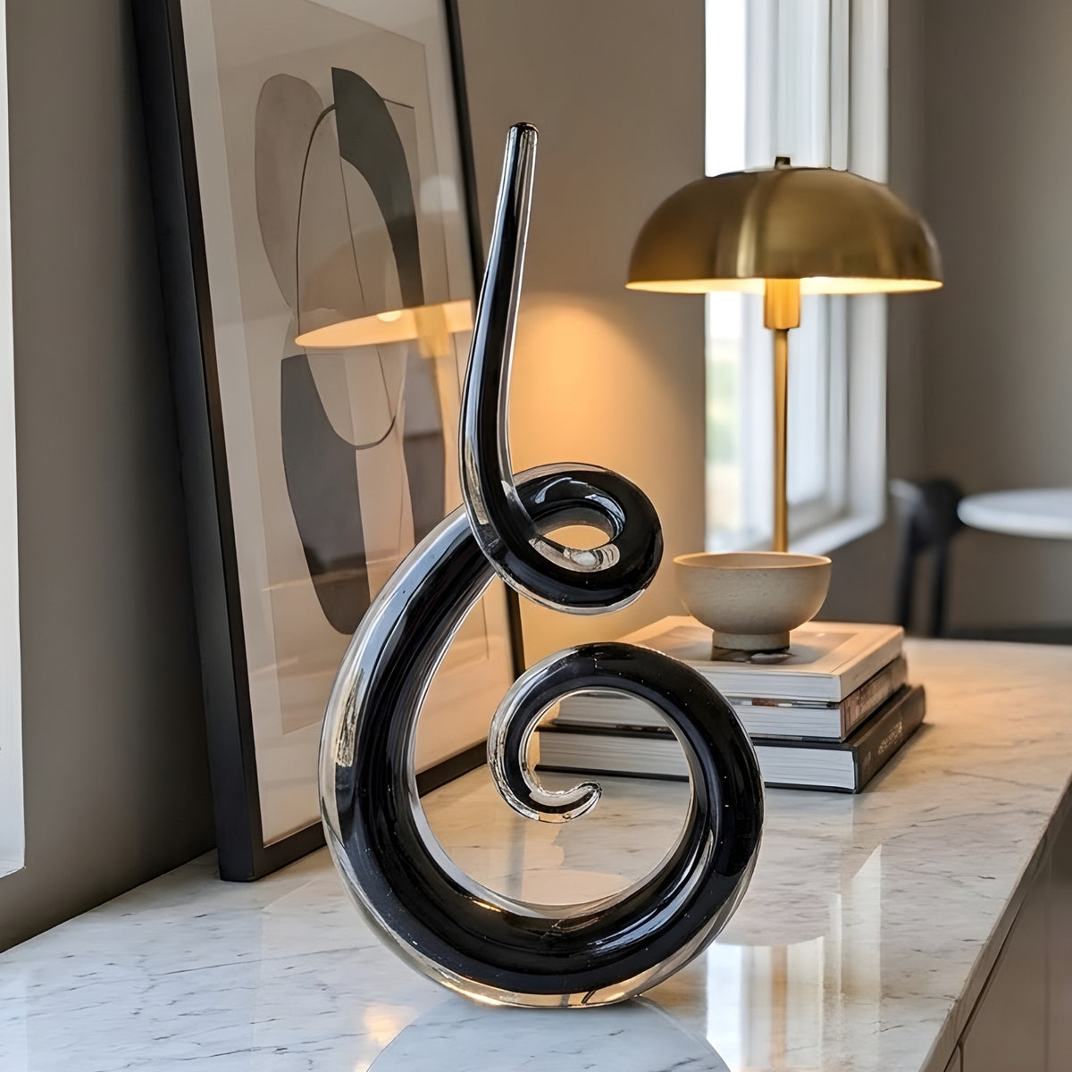 Cadence crystal showpiece styled with a table lamp and art