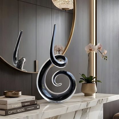 Cadence crystal abstract showpiece styled on a luxury console