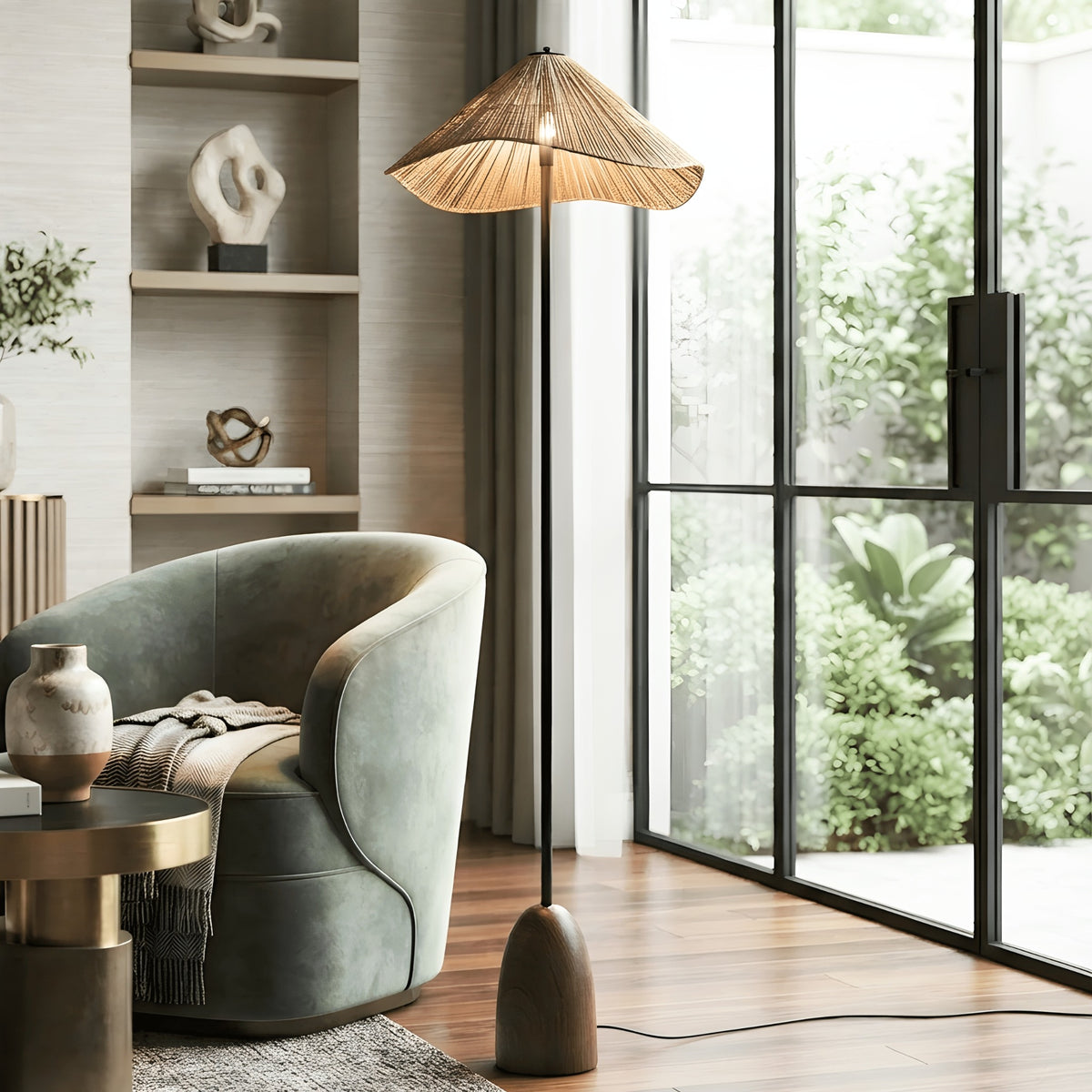 Canopy floor lamp illuminating a lounge corner beside a green accent chair