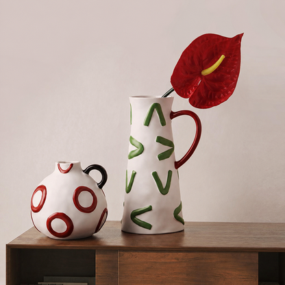 Canvas ceramic table vases styled on a console