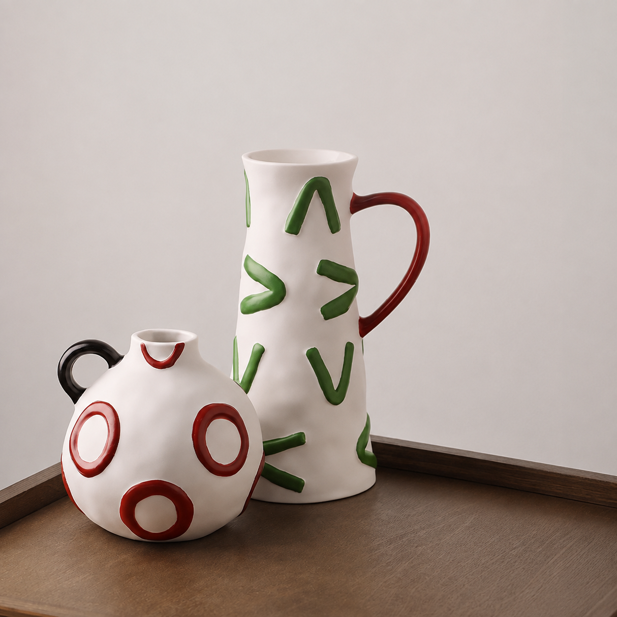 Canvas green and red ceramic table vases styled together