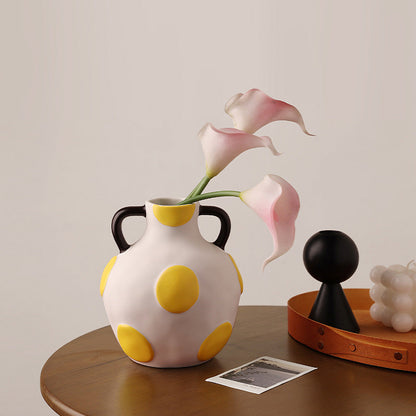 Canvas medium yellow ceramic table vase styled with flowers