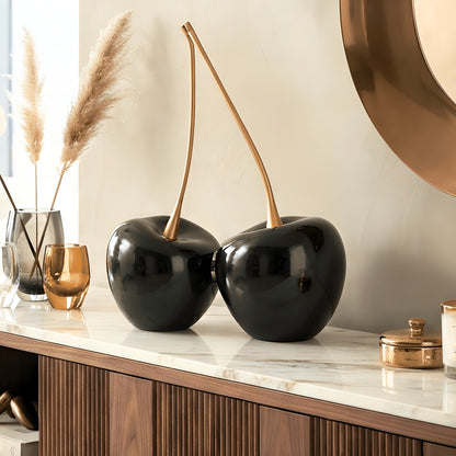 Cherish black and gold cherry showpiece styled on a luxury living room sideboard