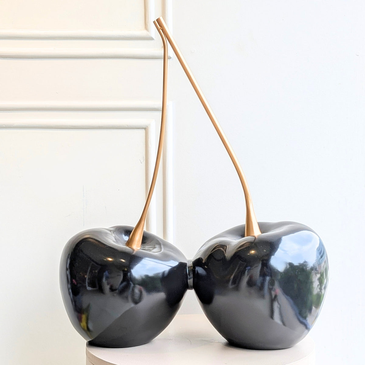 Cherish large black cherry showpiece with elongated gold metal stems