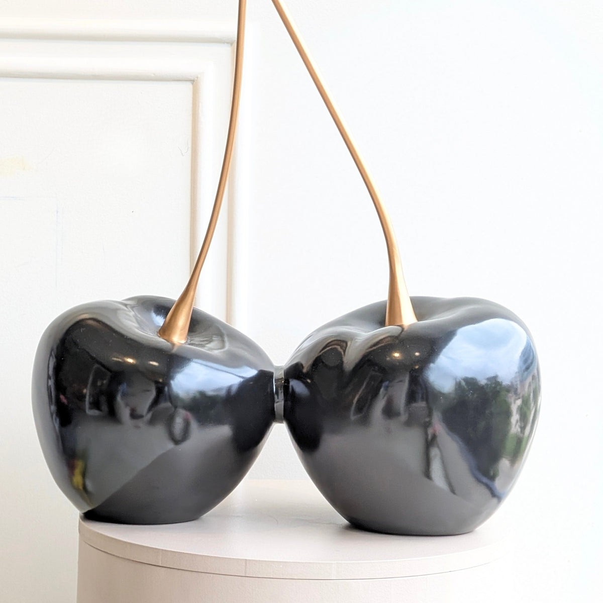 Cherish resin and metal cherry showpiece close product view for console styling