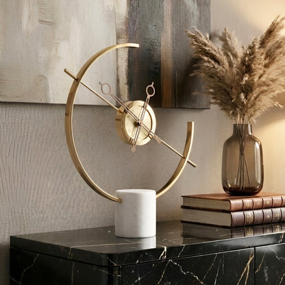 Chronos marble and metal table clock styled on a black marble console