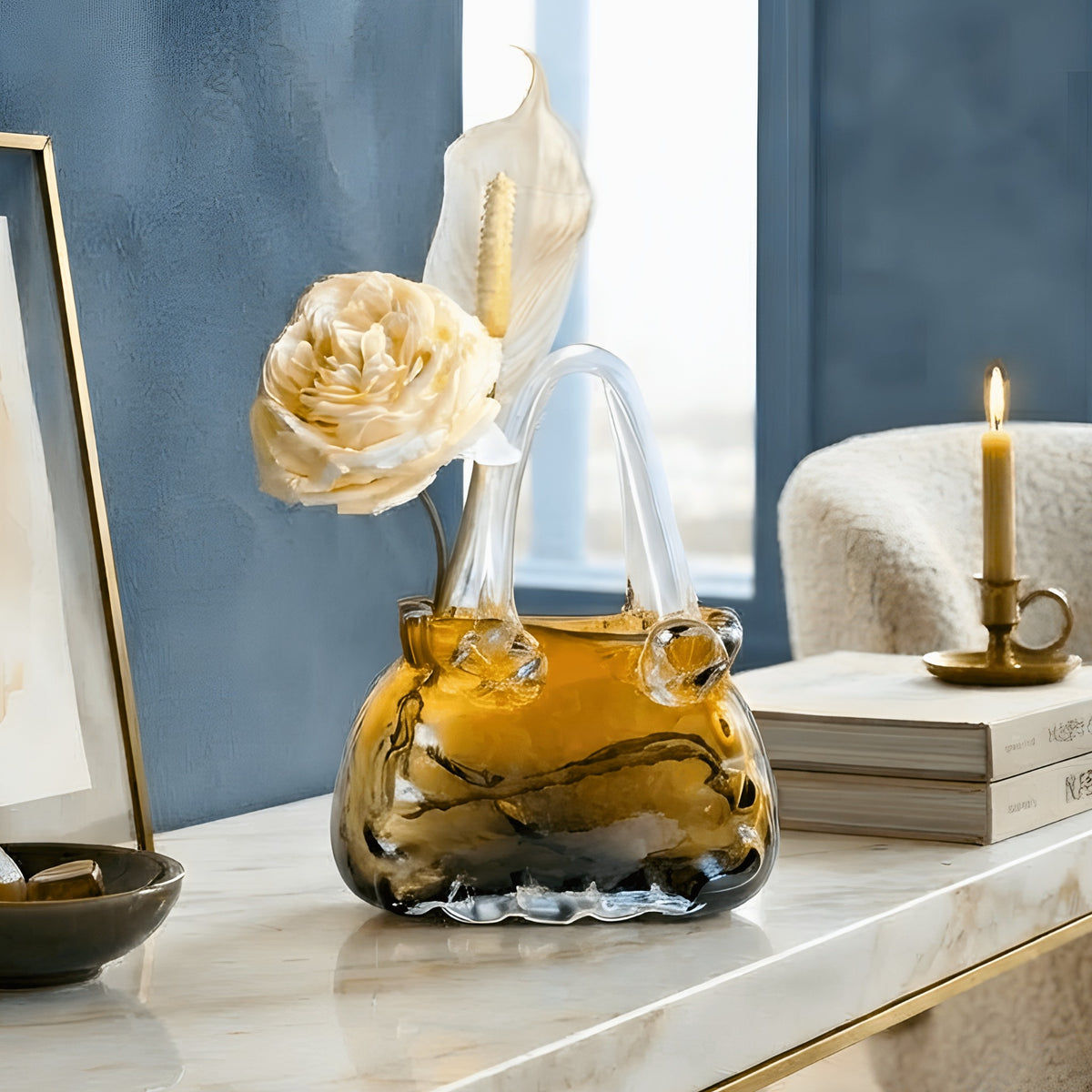Couture amber crystal handbag vase styled in a modern blue and neutral interior