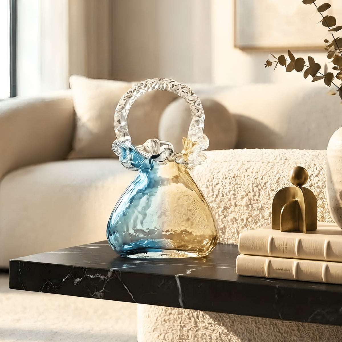 Couture blue-gold crystal handbag showpiece styled in a living room