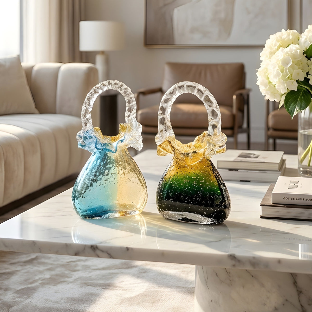 Couture crystal handbag showpieces styled on a marble coffee table