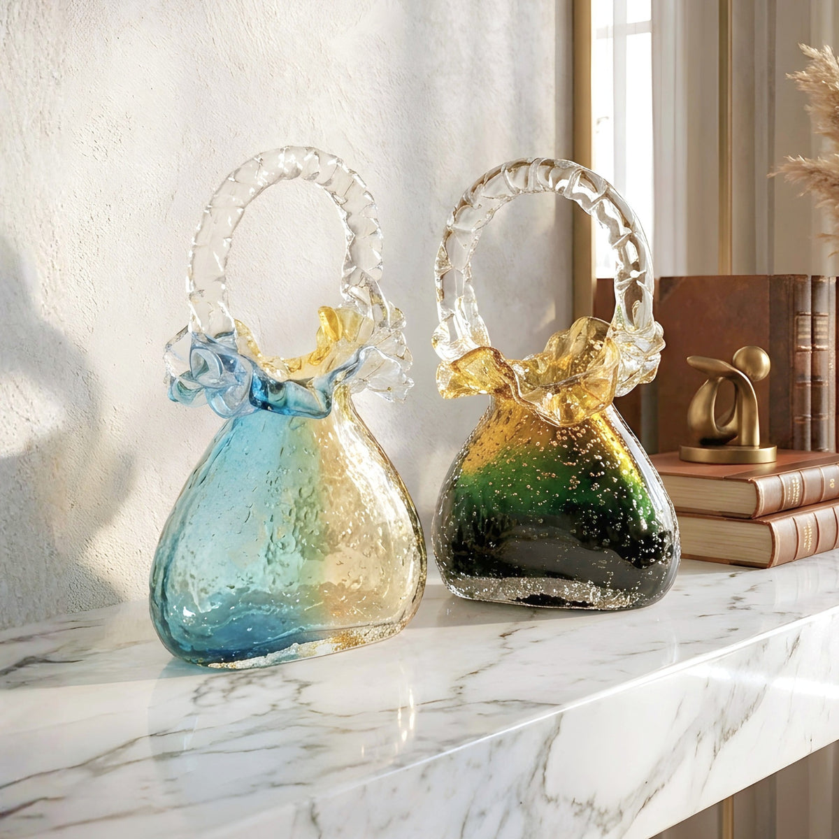 Couture crystal handbag showpieces styled on a marble console