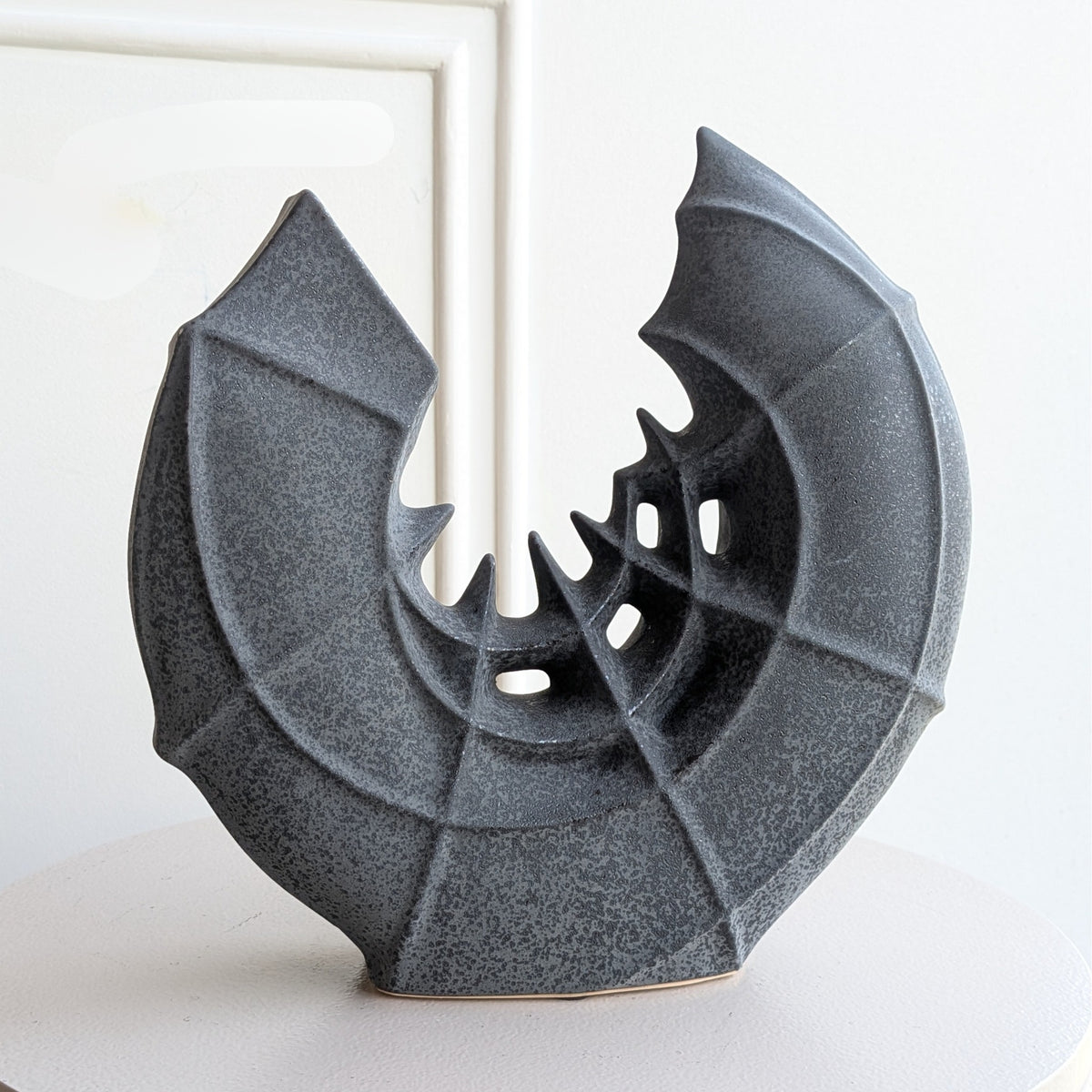 Crescent ceramic vase and sculptural showpiece front view