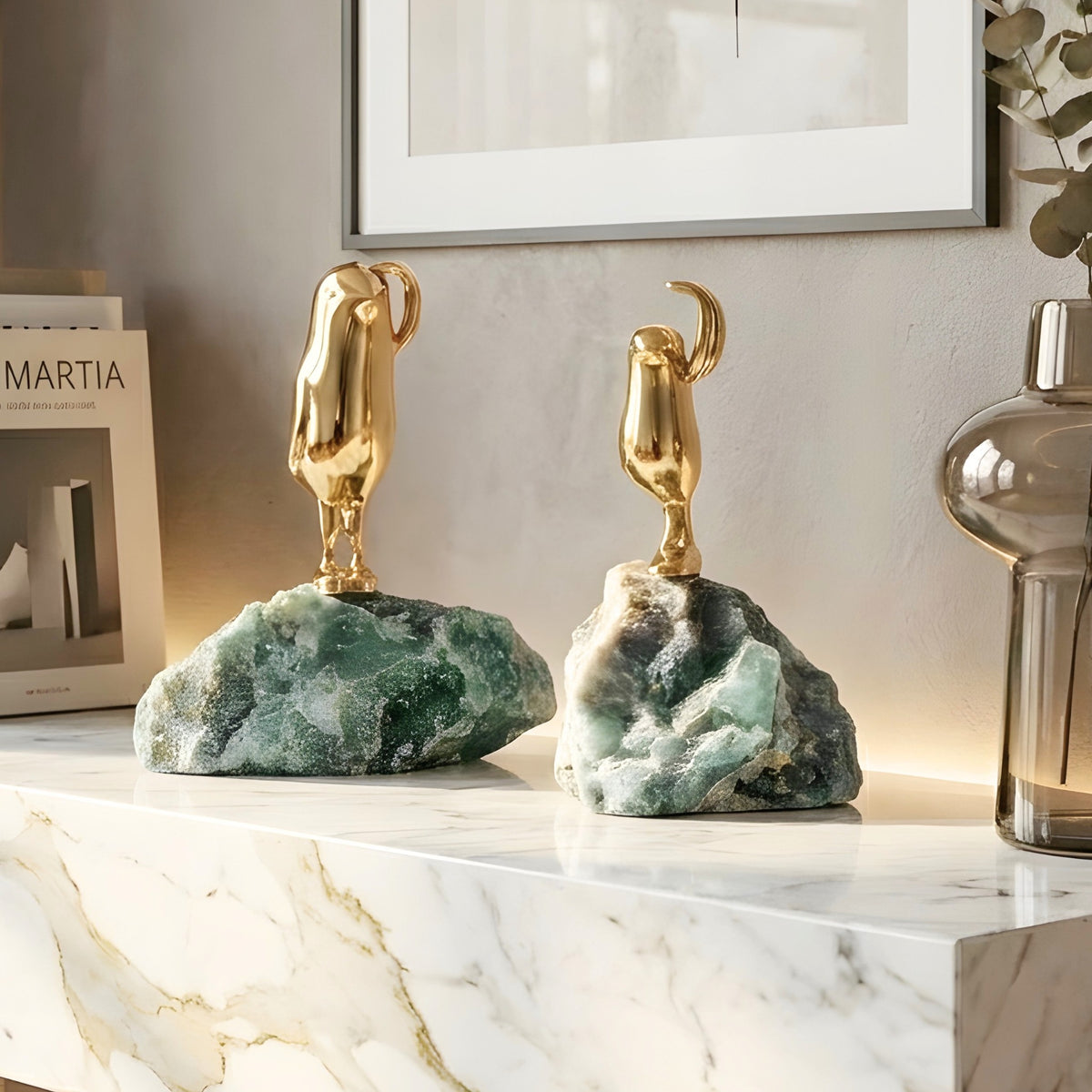 Flippers brass penguin sculptures on green natural stone for luxury console decor, view 1