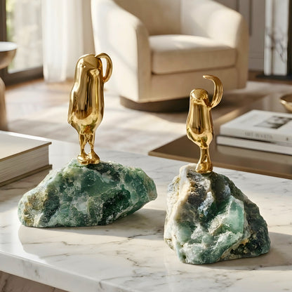 Flippers brass penguin sculptures on green natural stone for luxury console decor, view 2