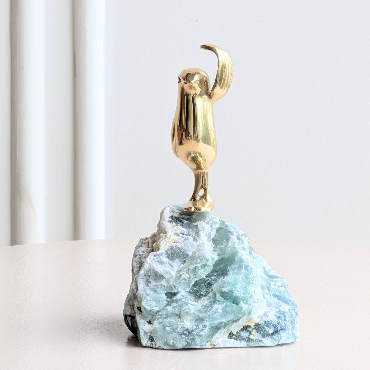 Flippers brass penguin sculptures on green natural stone for luxury console decor, view 6