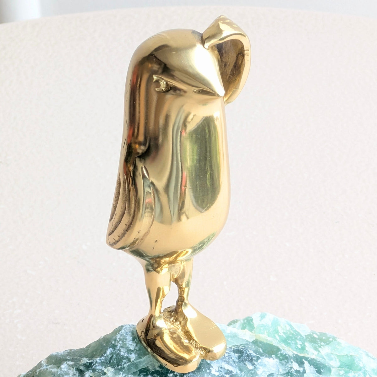 Flippers brass penguin sculptures on green natural stone for luxury console decor, view 9