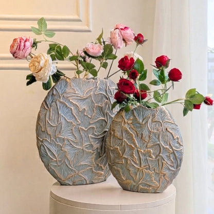 Folia large and small grey gold resin vases styled together on a pedestal