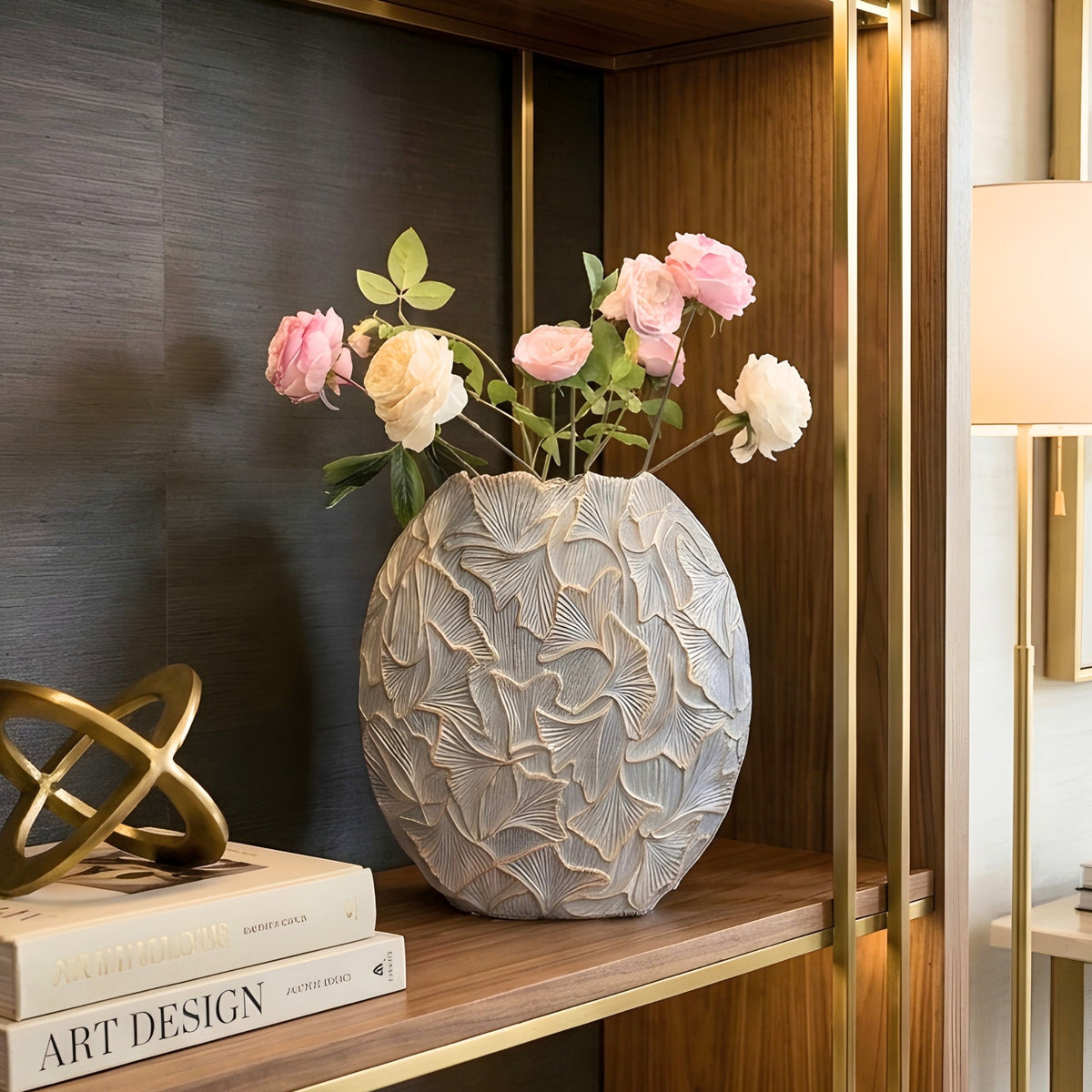 Folia large sculptural ginkgo leaf resin vase styled on a display shelf