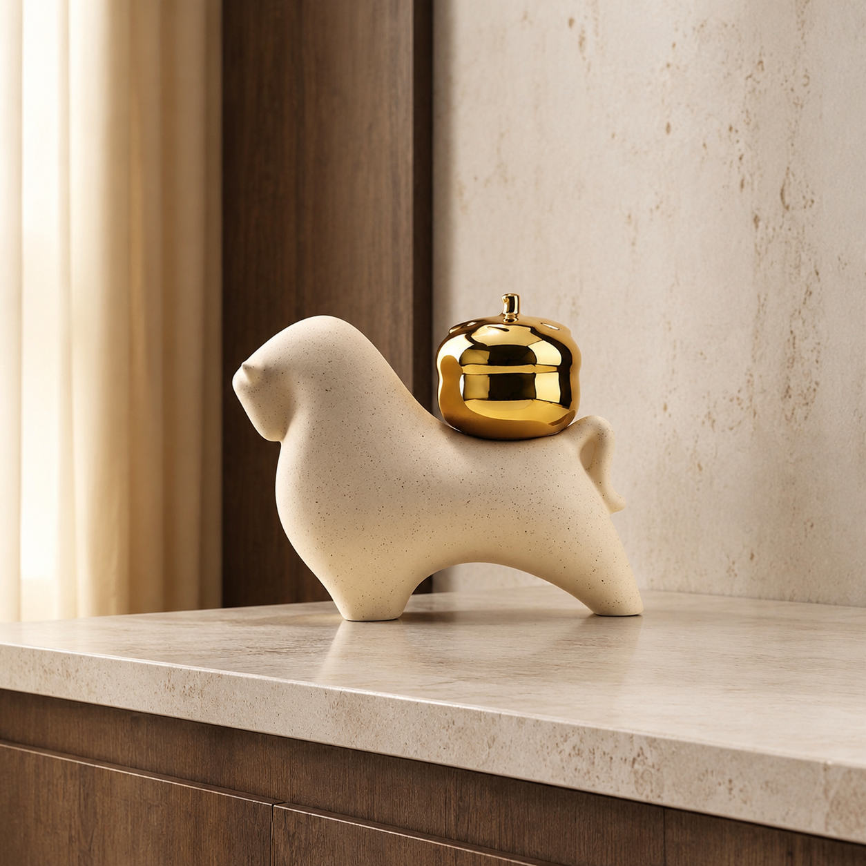 Fortuna beige ceramic bull showpiece styled on a luxury console